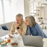 square image of couple discussing energy bills